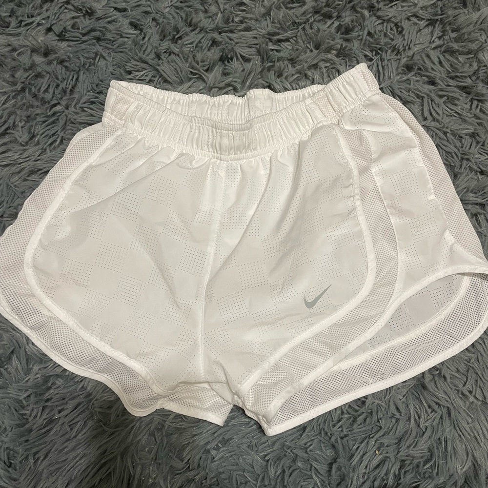 White Nike shorts